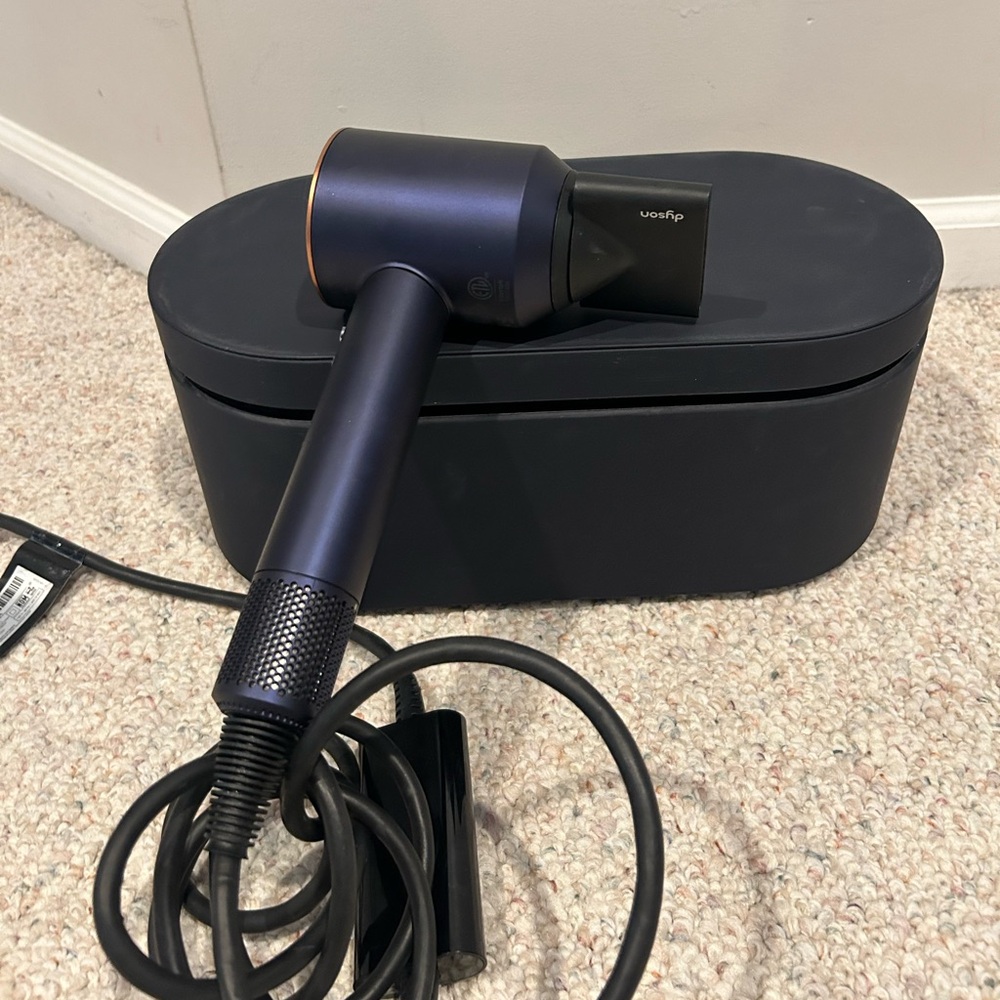 Brand new Dyson hair dryer with all 4 attachments. Purchased in May 2024.